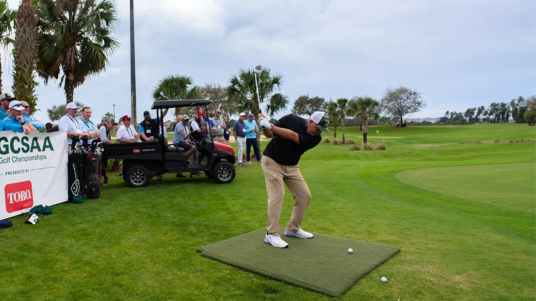 A player tees off during the GCSAA Golf Championships